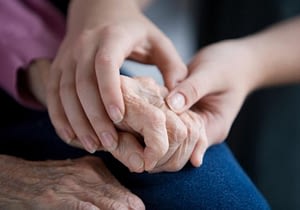 older child holding their parent's hand for guardianship