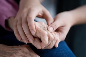 older child holding their parent's hand for guardianship